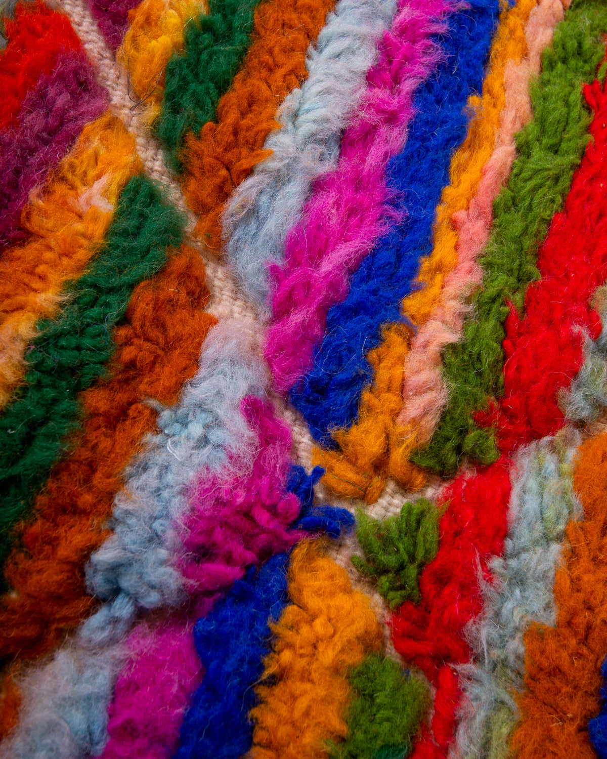 Modern, designer, handcrafted Berber rug from Morocco. Beniourain carpet with beautiful colours and patterns and fluffy wool texture.